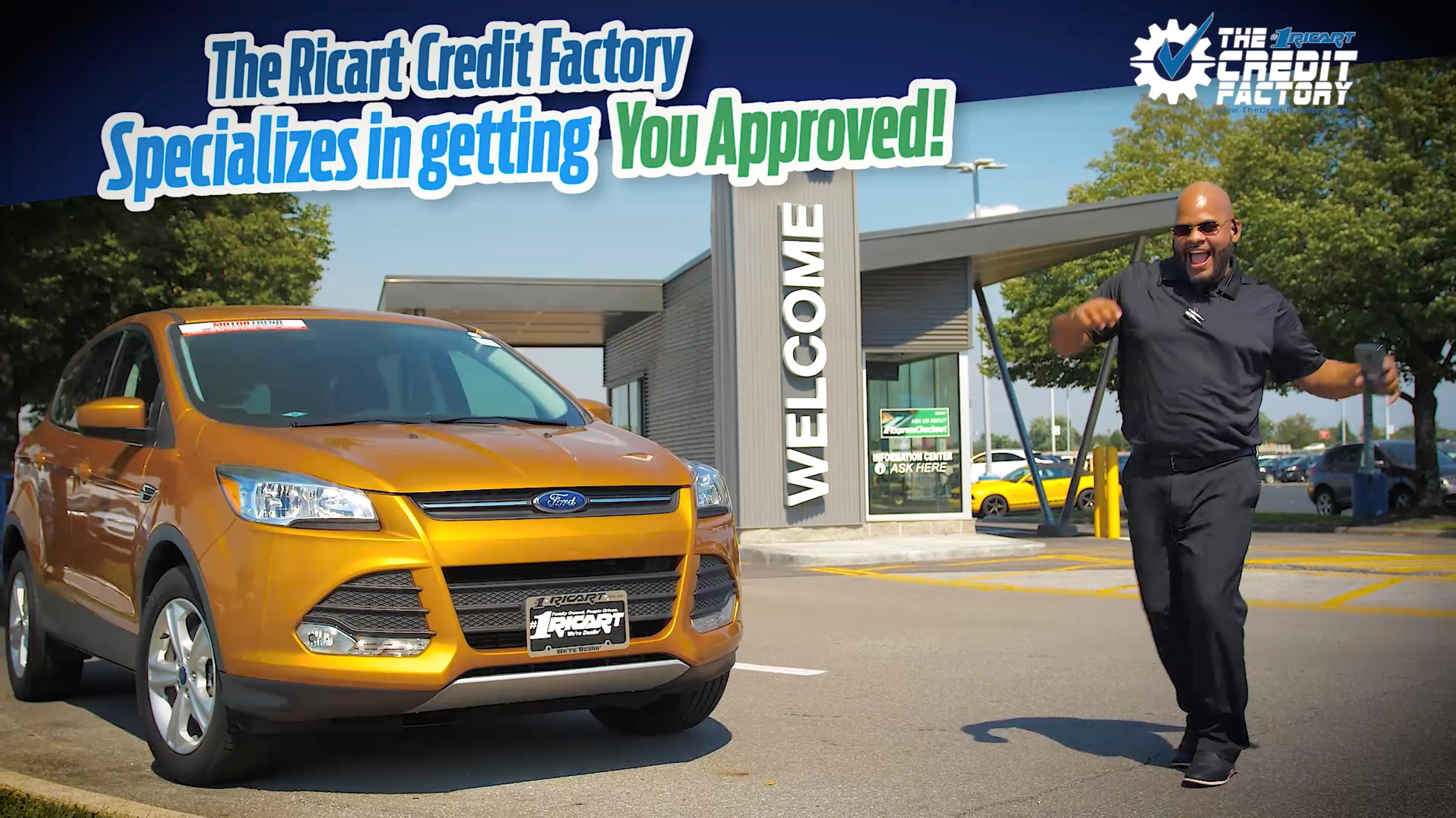 Happy man next to Ford SUV